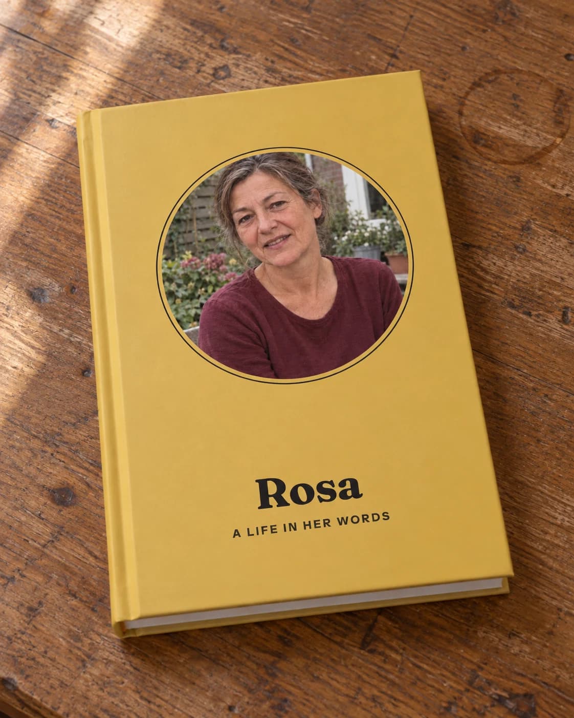 Rosa's finished yellow Told hardcover on her kitchen table.